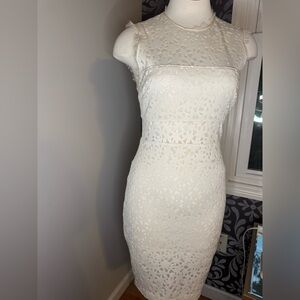 Elizabeth and James Levine Ivory cut midi dress laser cut body on sheer panel.
